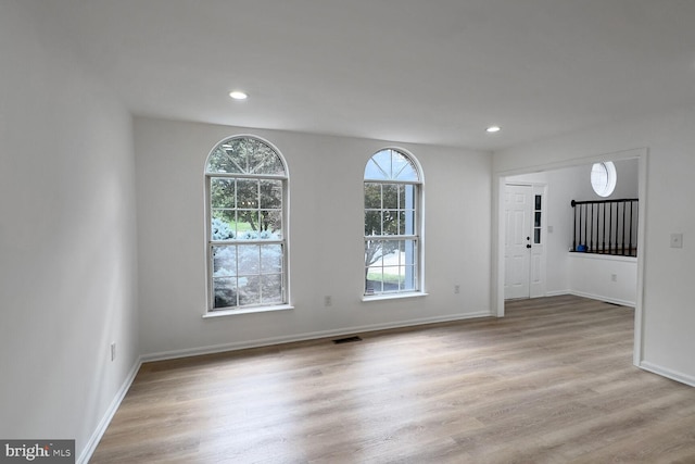 8916 Gladeside Dr, Clinton, MD 20735 - spare room with wood finished floors and recessed lighting