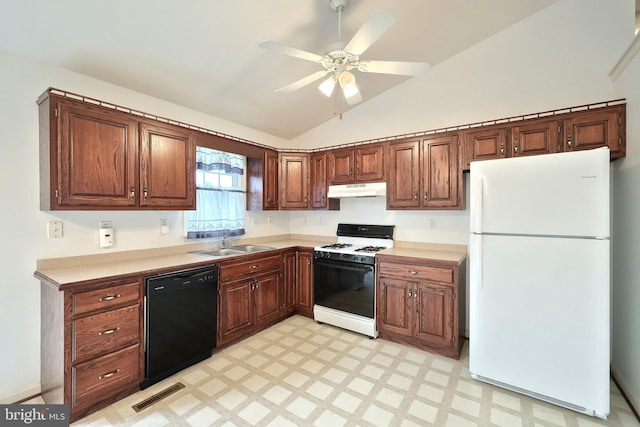 kitchen with freestanding refrigerator, range with gas stovetop, dishwasher, under cabinet range hood, and a sink