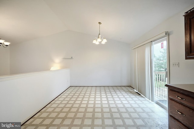 unfurnished dining area featuring a chandelier, lofted ceiling, and light floors