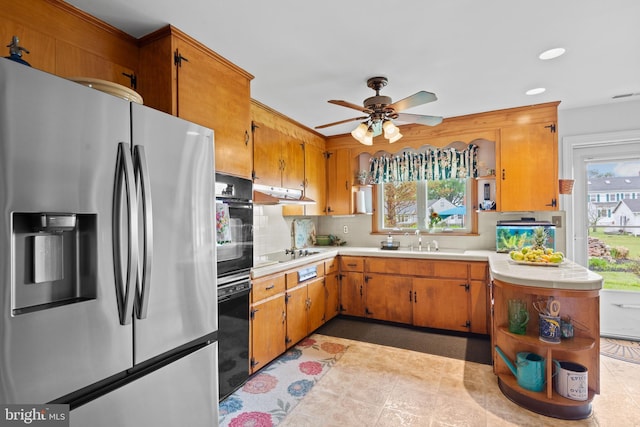 1 Somerset Ave, Cambridge, MD 21613 - kitchen with stainless steel fridge with ice dispenser, a sink, light countertops, black electric cooktop, and tasteful backsplash