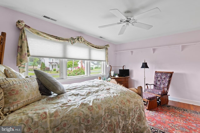 1 Somerset Ave, Cambridge, MD 21613 - bedroom featuring wood finished floors, ceiling fan, and baseboards
