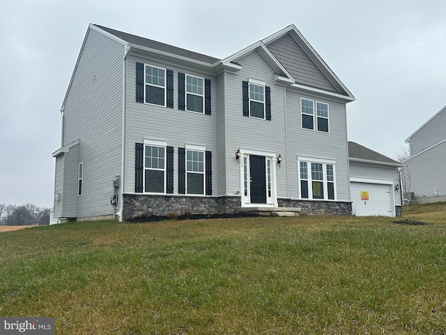 6 Bentley Ct, York Haven, PA 17370 - view of front facade with stone siding, a front lawn, and a garage