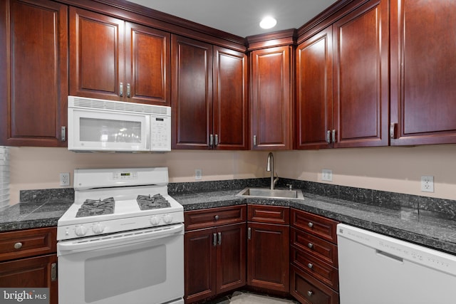 117 E Clement St, Baltimore, MD 21230 - kitchen featuring white appliances and a sink