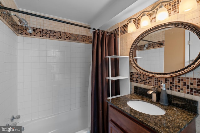 117 E Clement St, Baltimore, MD 21230 - bathroom featuring shower / bath combo with shower curtain, decorative backsplash, and vanity