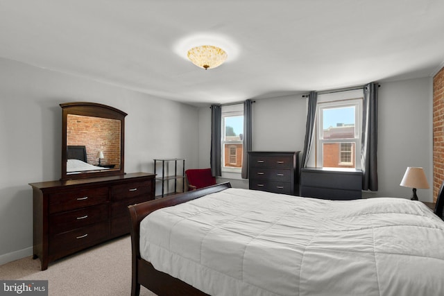 117 E Clement St, Baltimore, MD 21230 - bedroom with light colored carpet and baseboards