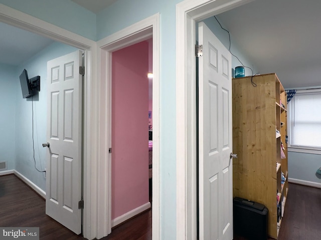 7020 Taylor Ter, Hyattsville, MD 20784 - hallway with dark wood-style flooring and baseboards