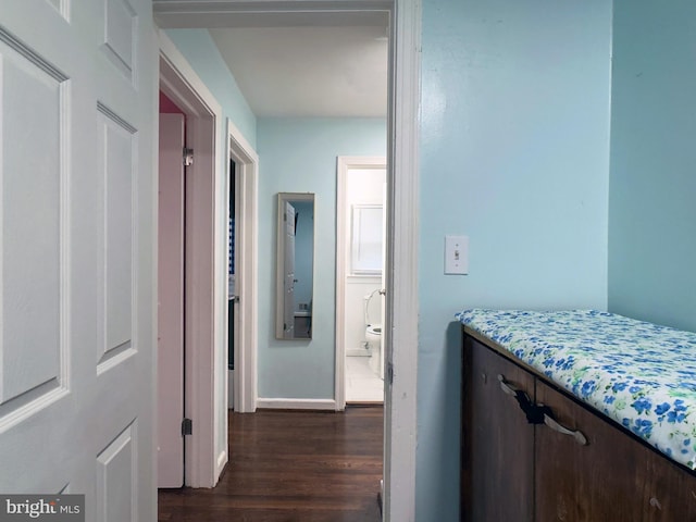 7020 Taylor Ter, Hyattsville, MD 20784 - hall featuring dark wood-style floors and baseboards