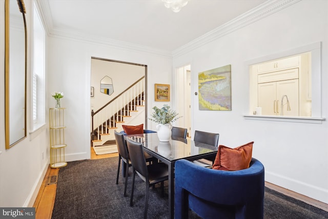300 S Columbus St, Alexandria, VA 22314 - dining room with stairway, crown molding, wood finished floors, and baseboards