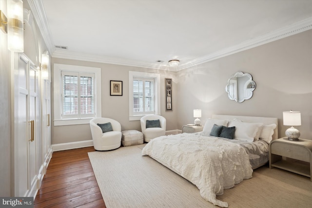 300 S Columbus St, Alexandria, VA 22314 - bedroom with ornamental molding, hardwood / wood-style flooring, and baseboards