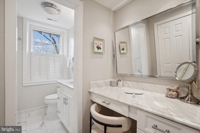 300 S Columbus St, Alexandria, VA 22314 - bathroom featuring vanity, marble finish flooring, baseboards, and toilet