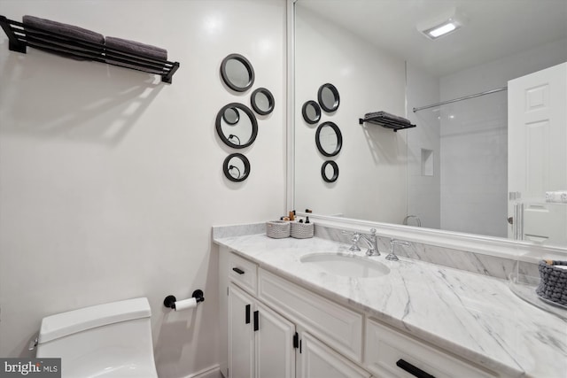 300 S Columbus St, Alexandria, VA 22314 - bathroom featuring toilet, vanity, and a shower