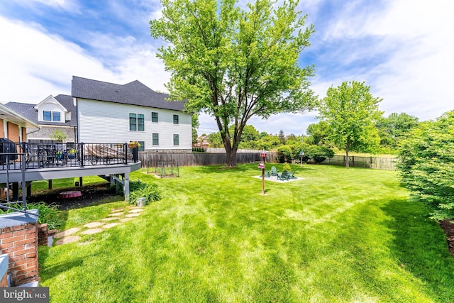 view of yard featuring a deck