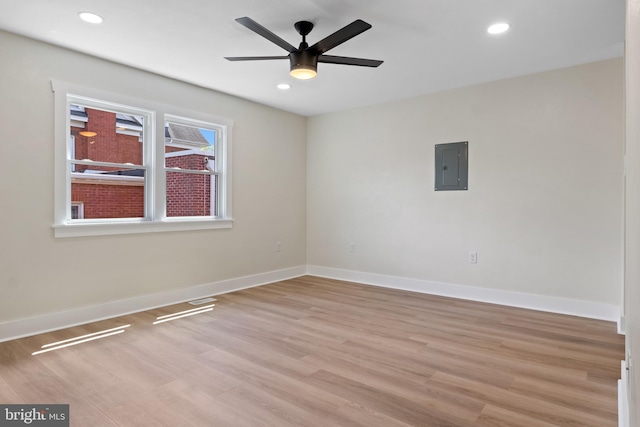 555 Carlisle St, Hanover, PA 17331 - unfurnished room with electric panel, light wood finished floors, a ceiling fan, baseboards, and recessed lighting