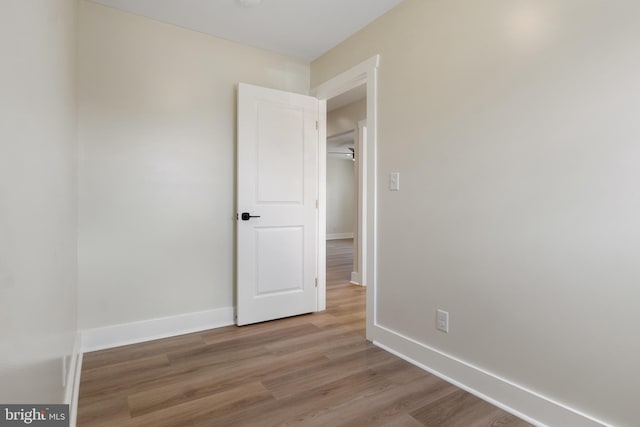 555 Carlisle St, Hanover, PA 17331 - empty room with wood finished floors and baseboards