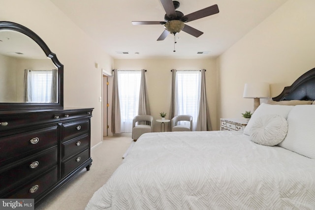 9712 Handerson Pl Unit 306, Manassas Park, VA 20111 - bedroom featuring light colored carpet, multiple windows, and a ceiling fan