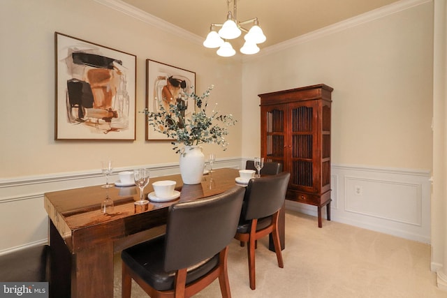 9712 Handerson Pl Unit 306, Manassas Park, VA 20111 - dining room with crown molding, a wainscoted wall, a chandelier, and light colored carpet