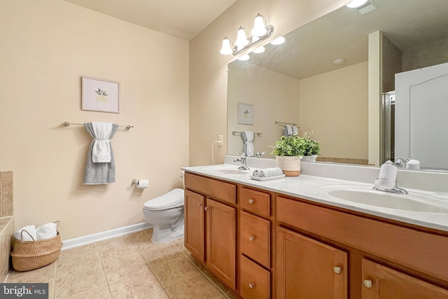 9712 Handerson Pl Unit 306, Manassas Park, VA 20111 - full bathroom with toilet, baseboards, tile patterned flooring, and double vanity