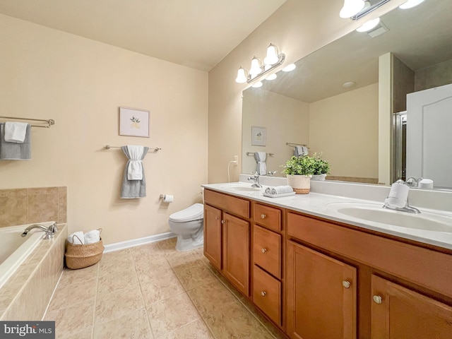 9712 Handerson Pl Unit 306, Manassas Park, VA 20111 - full bath featuring toilet, double vanity, tile patterned floors, baseboards, and tiled bath