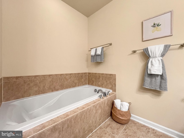 9712 Handerson Pl Unit 306, Manassas Park, VA 20111 - bathroom featuring a garden tub, baseboards, and tile patterned floors