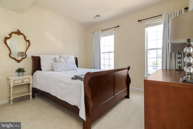 9712 Handerson Pl Unit 306, Manassas Park, VA 20111 - bedroom featuring light carpet and baseboards