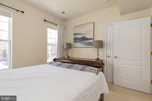 9712 Handerson Pl Unit 306, Manassas Park, VA 20111 - bedroom featuring light carpet