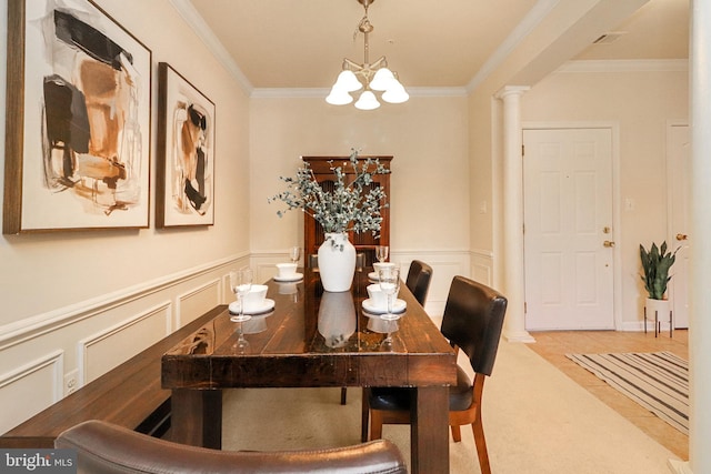 9712 Handerson Pl Unit 306, Manassas Park, VA 20111 - dining area featuring ornamental molding, a chandelier, and wainscoting