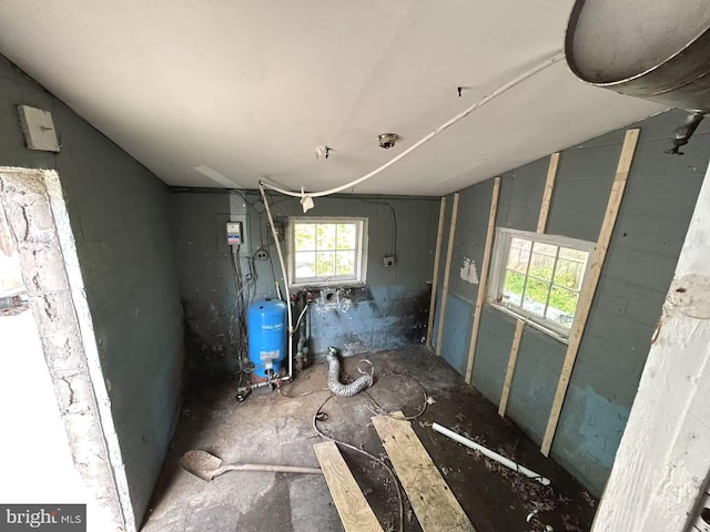 basement with a water pressure tank
