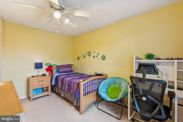 carpeted bedroom featuring a ceiling fan