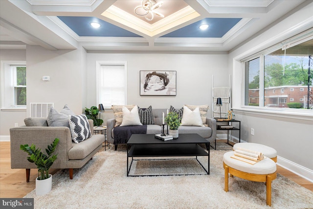 3920 Mortimer Ave, Baltimore, MD 21215 - living room featuring wood finished floors, ornamental molding, baseboards, beam ceiling, and coffered ceiling