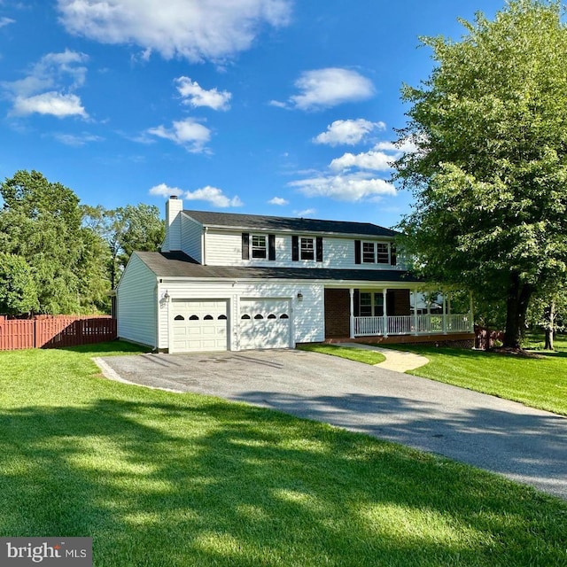 10205 Scaggsville Rd, Laurel, MD 20723 - traditional home featuring asphalt driveway, a porch, a chimney, and an attached garage