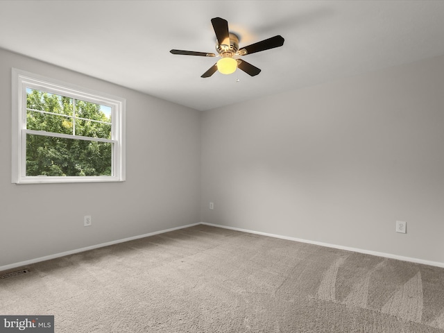 10205 Scaggsville Rd, Laurel, MD 20723 - carpeted empty room with a ceiling fan and baseboards