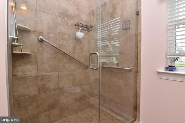 full bathroom featuring a stall shower