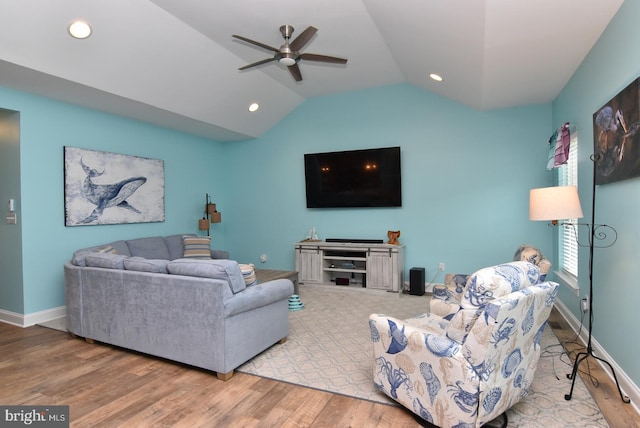living area with vaulted ceiling, ceiling fan, wood finished floors, recessed lighting, and baseboards