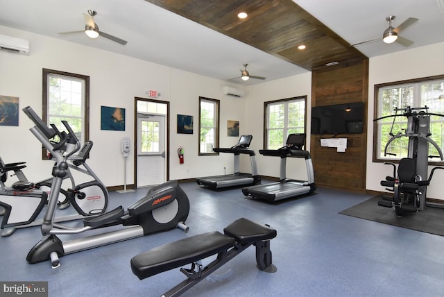 workout area featuring a ceiling fan, a wall unit AC, wood ceiling, recessed lighting, and baseboards