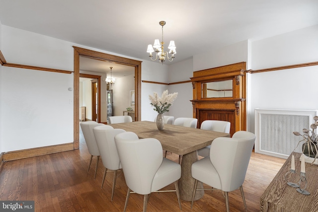 108 3rd St NE, Washington, DC 20002 - dining area featuring a chandelier and wood finished floors