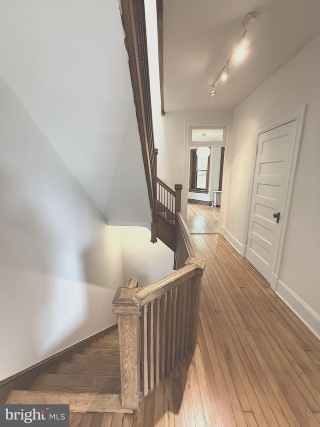 108 3rd St NE, Washington, DC 20002 - staircase with track lighting and hardwood / wood-style floors