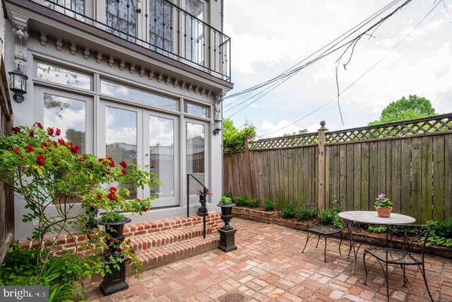108 3rd St NE, Washington, DC 20002 - patio / terrace with a fenced backyard, a patio area, and entry steps