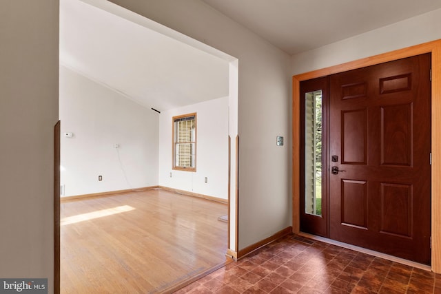 entrance foyer featuring baseboards
