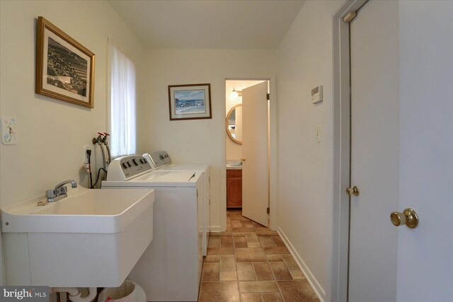 438 N 4th St, Halifax, PA 17032 - laundry room featuring separate washer and dryer, stone finish flooring, and baseboards