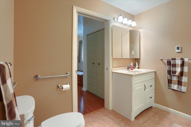 438 N 4th St, Halifax, PA 17032 - bathroom with toilet, vanity, tile patterned flooring, and baseboards