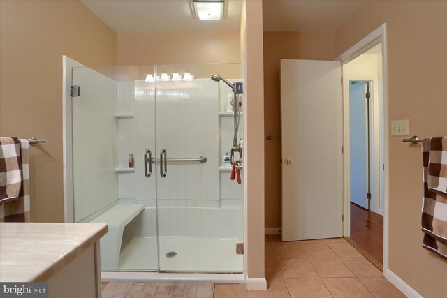 438 N 4th St, Halifax, PA 17032 - bathroom with a stall shower, tile patterned flooring, and baseboards