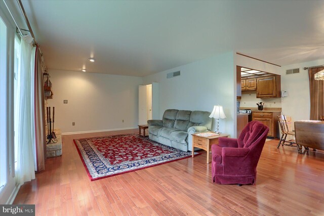 438 N 4th St, Halifax, PA 17032 - living area with light wood-style floors and baseboards