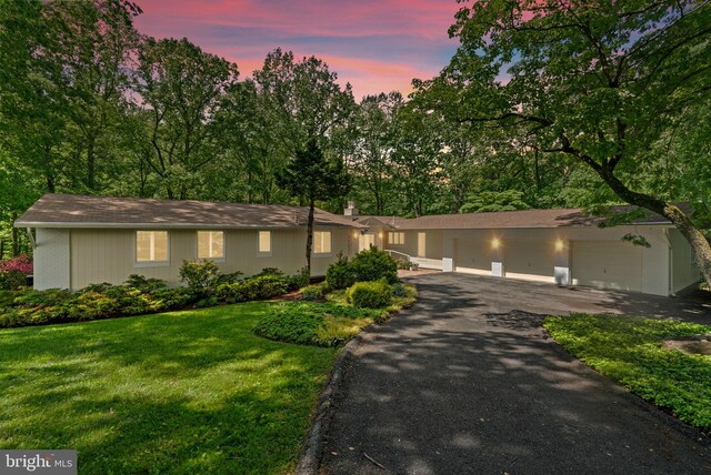 17810 Pond Rd, Ashton, MD 20861 - single story home with asphalt driveway, a garage, and a yard