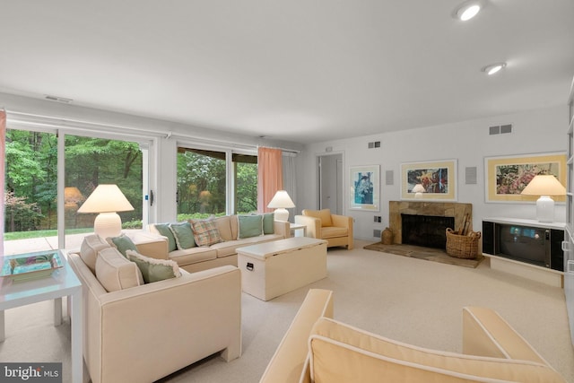 17810 Pond Rd, Ashton, MD 20861 - living area featuring carpet and a fireplace with raised hearth
