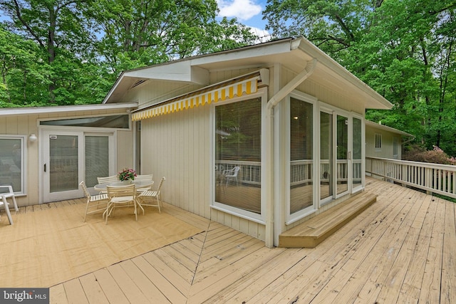 17810 Pond Rd, Ashton, MD 20861 - deck with outdoor dining space and a sunroom