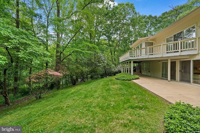 17810 Pond Rd, Ashton, MD 20861 - view of grassy yard with a patio area