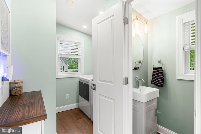 401 Woodland Ave, Glendora, NJ 08029 - bathroom with baseboards, wood finished floors, washer / clothes dryer, vanity, and recessed lighting