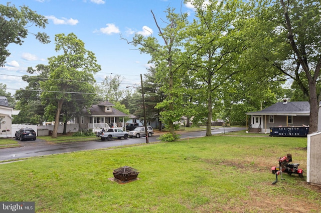 401 Woodland Ave, Glendora, NJ 08029 - view of grassy yard featuring an outdoor fire pit