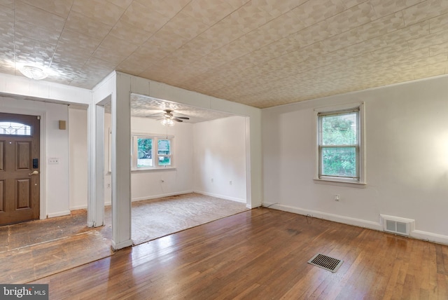6109 Oakland Mills Rd, Sykesville, MD 21784 - entrance foyer with hardwood / wood-style floors, a ceiling fan, and baseboards