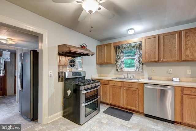 6109 Oakland Mills Rd, Sykesville, MD 21784 - kitchen with stainless steel appliances, a sink, light countertops, ceiling fan, and custom exhaust hood